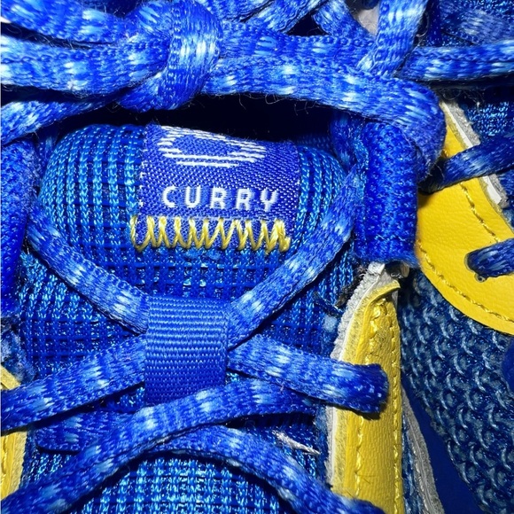 Steph Curry UA Kids Blue and Yellow Sneakers - Picture 6 of 8